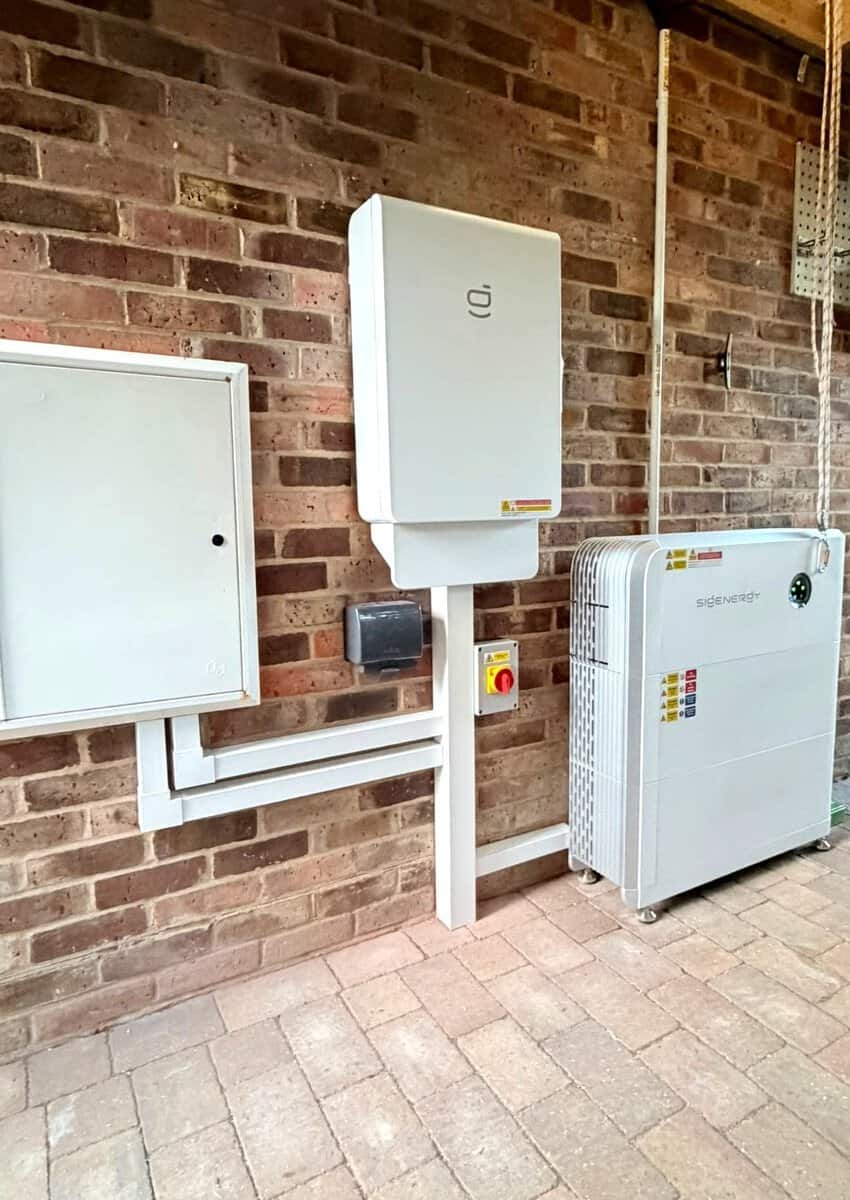 Sigenergy battery and gateway installed on a brick wall by Skylar Solar