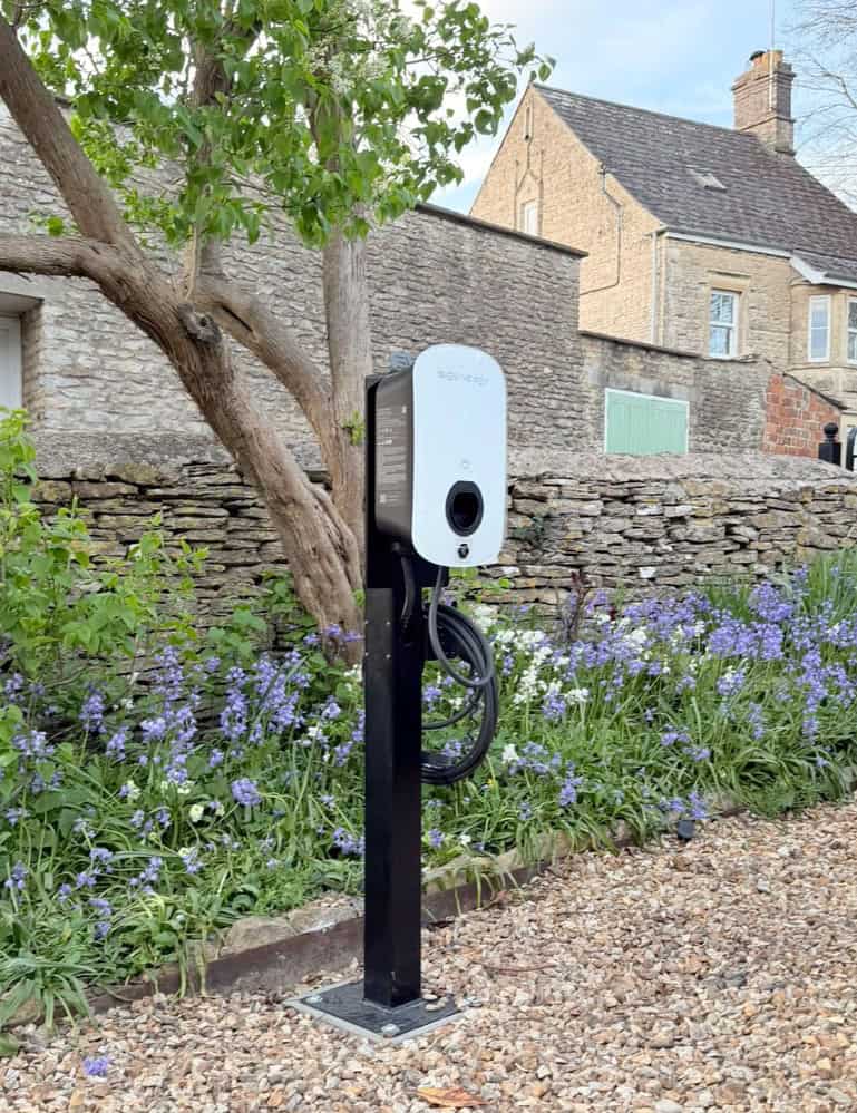Sigenergy EV charger on a post beside a driveway, installed by Skylar Solar